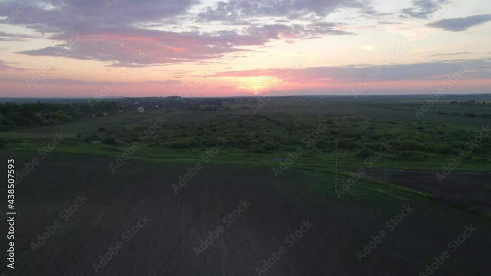 sunset over farm lands sunset over farm lands