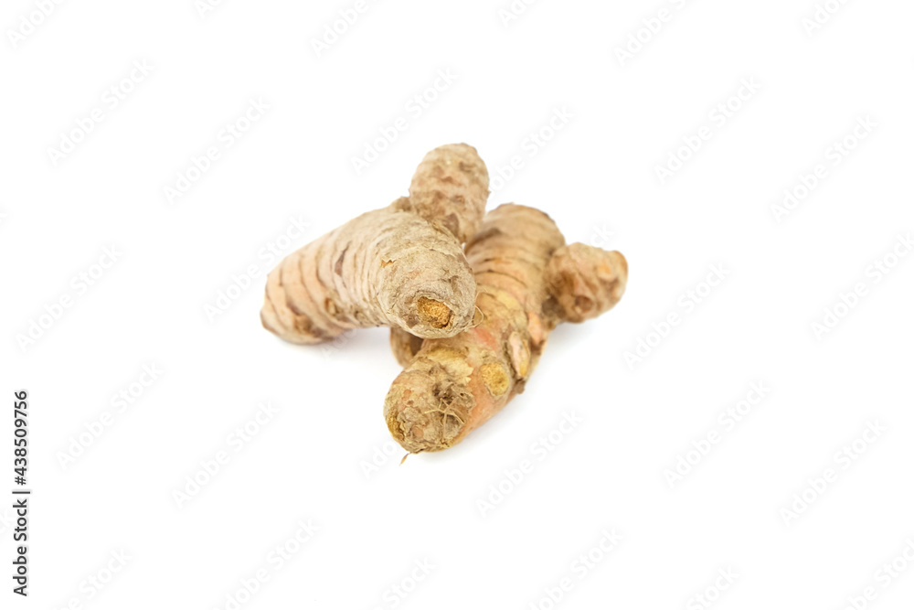 Turmeric spice rhizome isolated on white background. Heap of curcuma longa roots Turmeric spice rhizome isolated on white background. Heap of curcuma longa roots