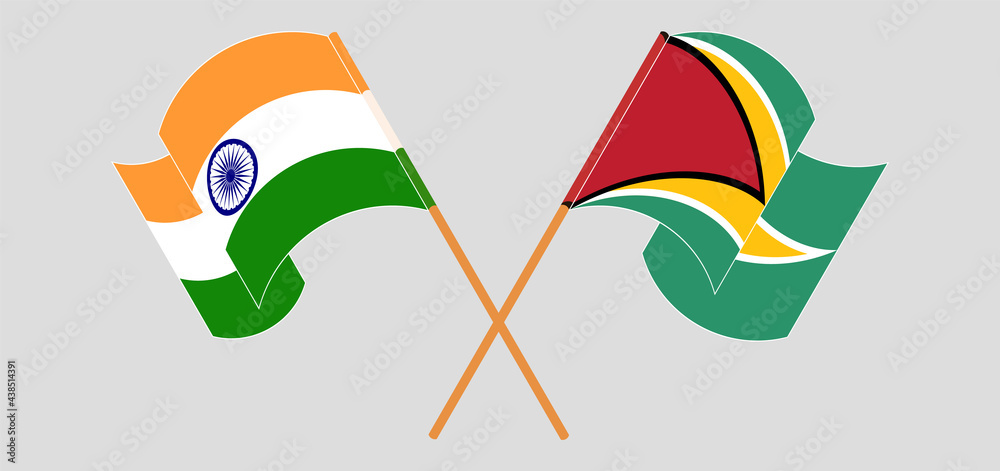 Crossed and waving flags of India and Guyana Crossed and waving flags of India and Guyana