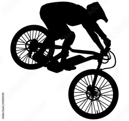 MTB downhill, enduro cross mountain biker doing an extreme jump on a mountain bike. MTB dh downhill mountain bike with helmet and protectors safety equipment. Vector illustration realistic silhouette photo