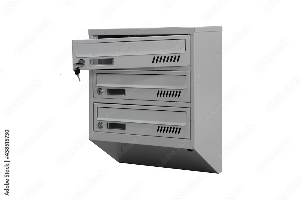 Gray mailboxes on the white background isolated. Mail box for entrance of apartment house. Metal mailbox Gray mailboxes on the white background isolated. Mail box for entrance of apartment house. Metal mailbox