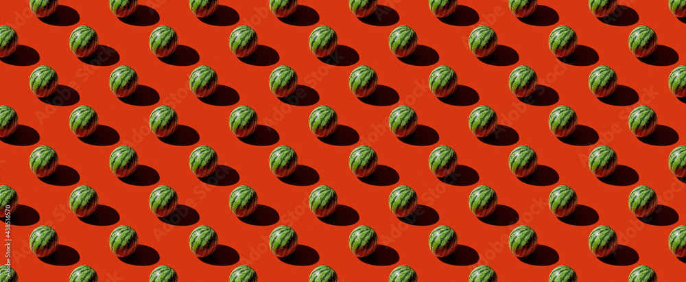 Fototapeta premium Pattern of watermelon on red background