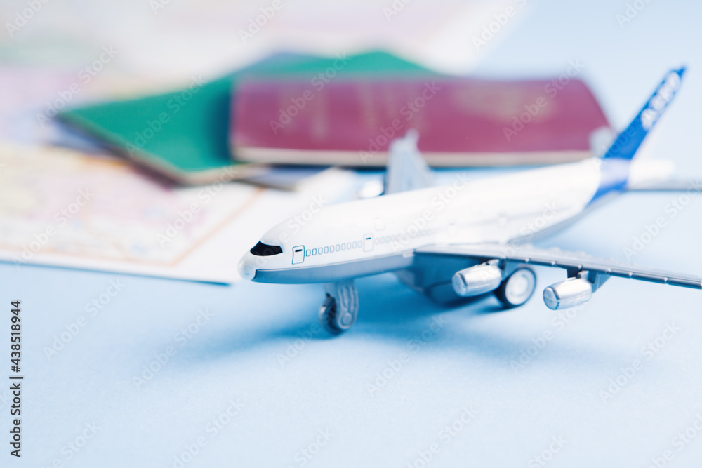 plane and passports on the table plane and passports on the table