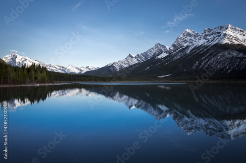Fototapeta Naklejka Na Ścianę i Meble -  Reflection of the Canadian Rocky Mountains in the still water of the Goat Lake in Kananaskis Provincial Park