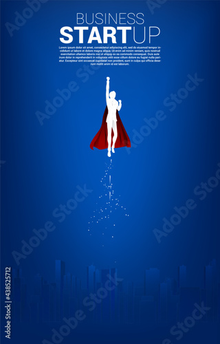 Silhouette of businessman flying in sky with the city. Business Concept for start up and fast growth company.