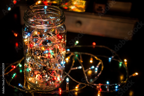 Glass jar with fairy lights photo