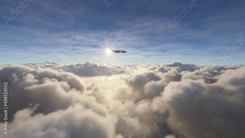 Side view of a private airplane flying over clouds: Aerial view of a small jet plane during a flight over the clouds