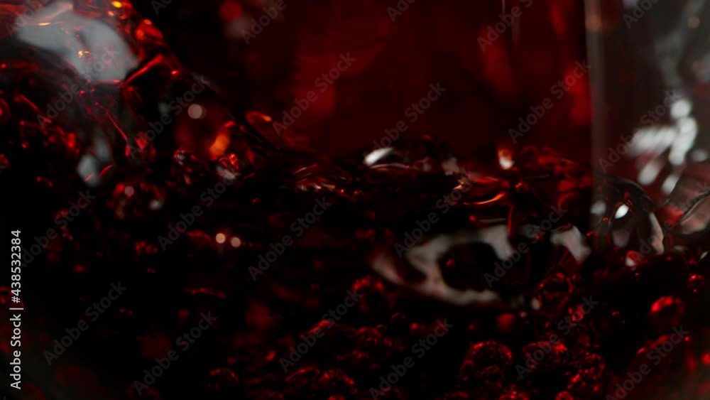 Super slow motion of splashing red wine. Filmed on high speed cinema camera, 1000 fps. Super slow motion of splashing red wine. Filmed on high speed cinema camera, 1000 fps.