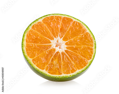 green orange tangerine slice on white background