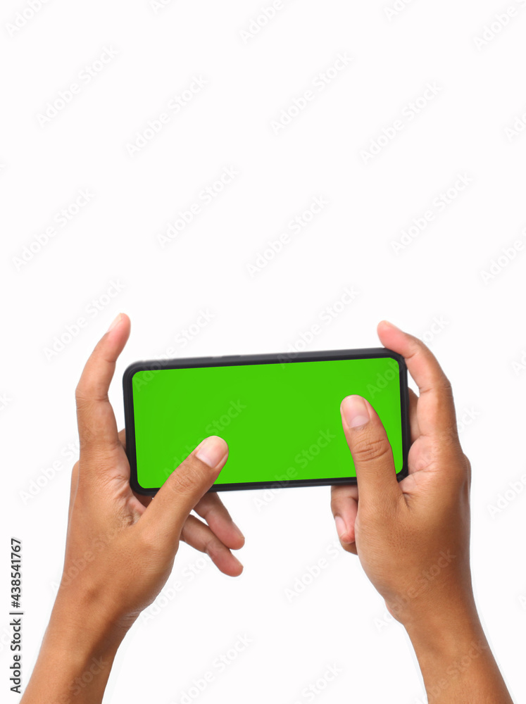 Man's hand holding the black smartphone with blank screen and modern frameless design. Isolated on white background. Man's hand holding the black smartphone with blank screen and modern frameless design. Isolated on white background.