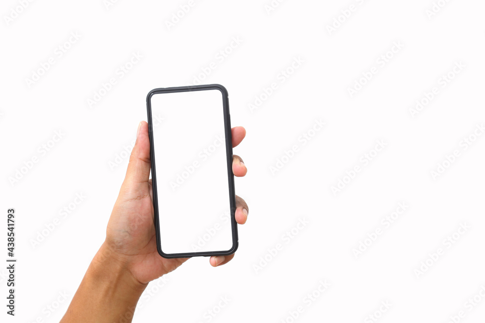 Man's hand holding the black smartphone with blank screen and modern frameless design. Isolated on white background. Man's hand holding the black smartphone with blank screen and modern frameless design. Isolated on white background.