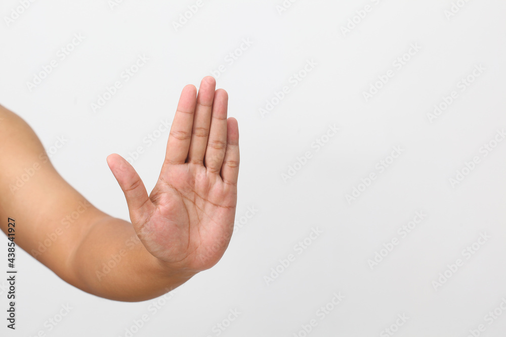 Man's hand with stop gesture. Isolated on white background Man's hand with stop gesture. Isolated on white background