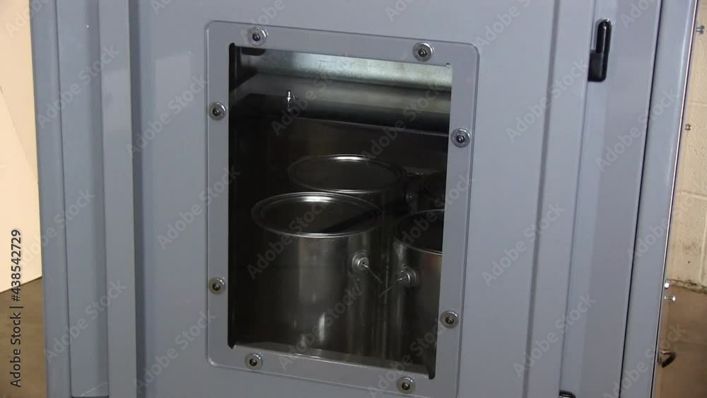 Paint mixer shaking paint can Paint mixer shaking paint can