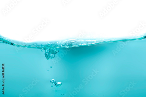 Clear water surface in a square shaped glass like a sea or a separate fish tank on a white background.