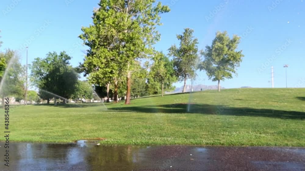 Morning sprinklers at the local park Morning sprinklers at the local park