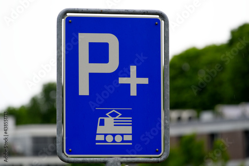 Blue park and ride traffic sign at railway station of village of Eglisau, canton Zurich. Photo taken June 9th, 2021, Eglisau, Switzerland.