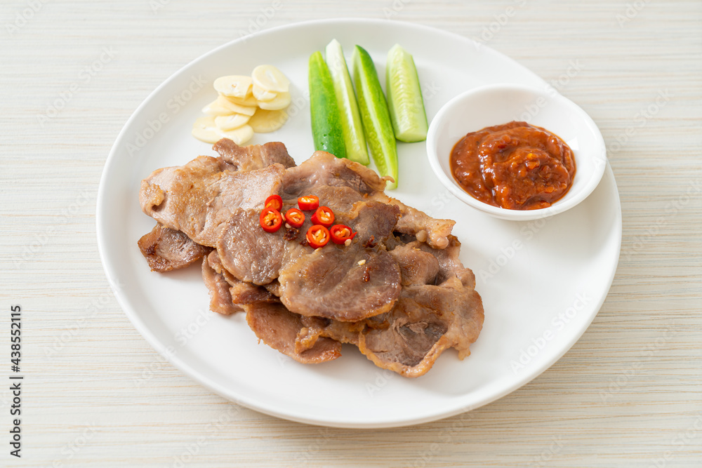 grilled pork neck sliced on plate grilled pork neck sliced on plate