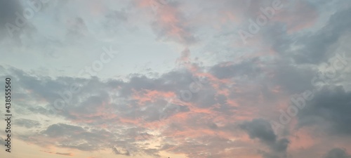 potrait shot of sky in India with moving clouds returning to their home. photo