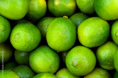 Lemon lime green fruit. Close-up background image. Illustration for the harvest period, agriculture, different types of fruits.