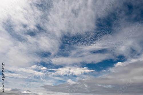 Blue cloudy sky background. Nature wallpaper © mark_gusev