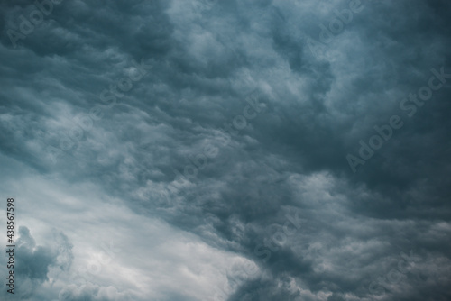 Sky landscape. Dark blue storm clouds, cloudy sky before rain. Dramatic skies, bad stormy weather. Natural background