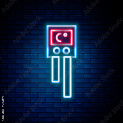 Glowing neon line Temperature and humidity sensor icon isolated on brick wall background. Colorful outline concept. Vector