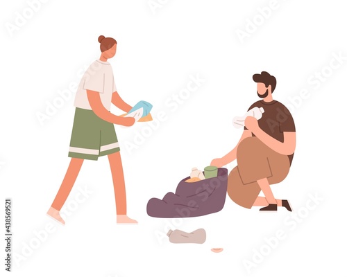 Couple of man and woman picking and collecting plastic garbage into trash bag...