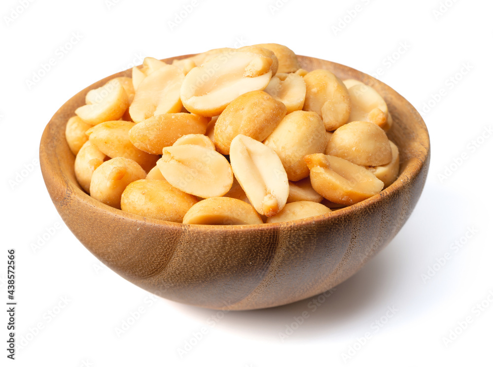 roasted peanuts in the wooden bowl, isolated on white roasted peanuts in the wooden bowl, isolated on white