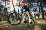 Mountain bike cyclist riding trail in forestt.Healthy lifestyle and outdoors adventure.