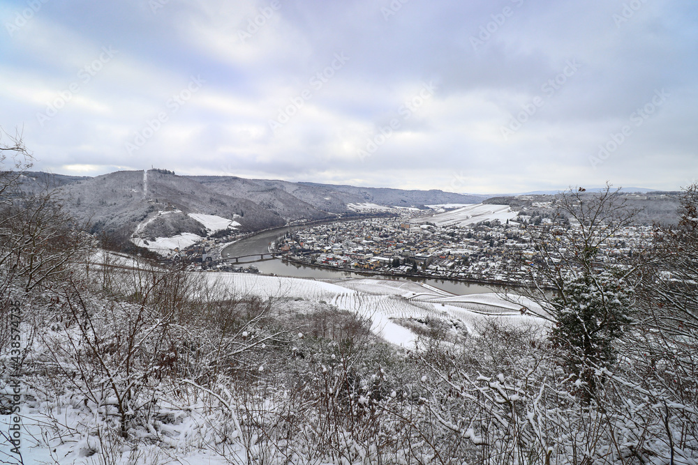 Wintry scenery of snow covered valley in the town of Bernkastel-kues, Germany