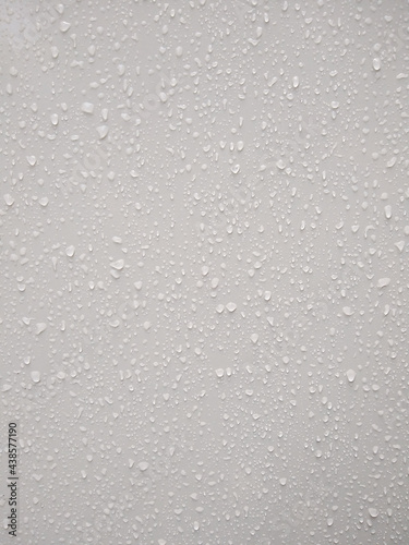 Water droplets on white board, background image