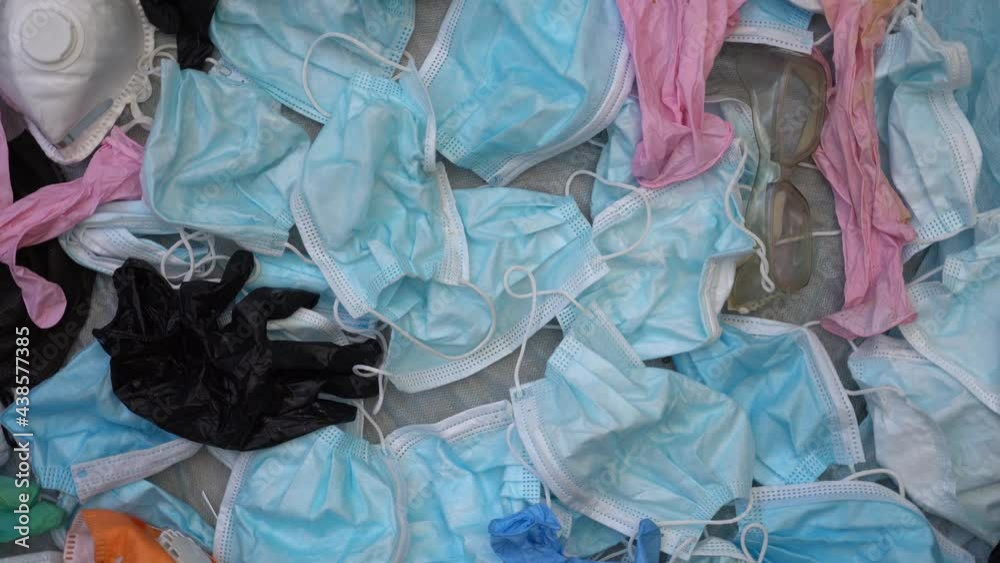 COVID19 Waste Pollution crisis. Used discarded disposable face masks