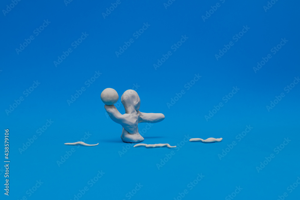 A white modeling clay dummy practicing water polo A white modeling clay dummy practicing water polo