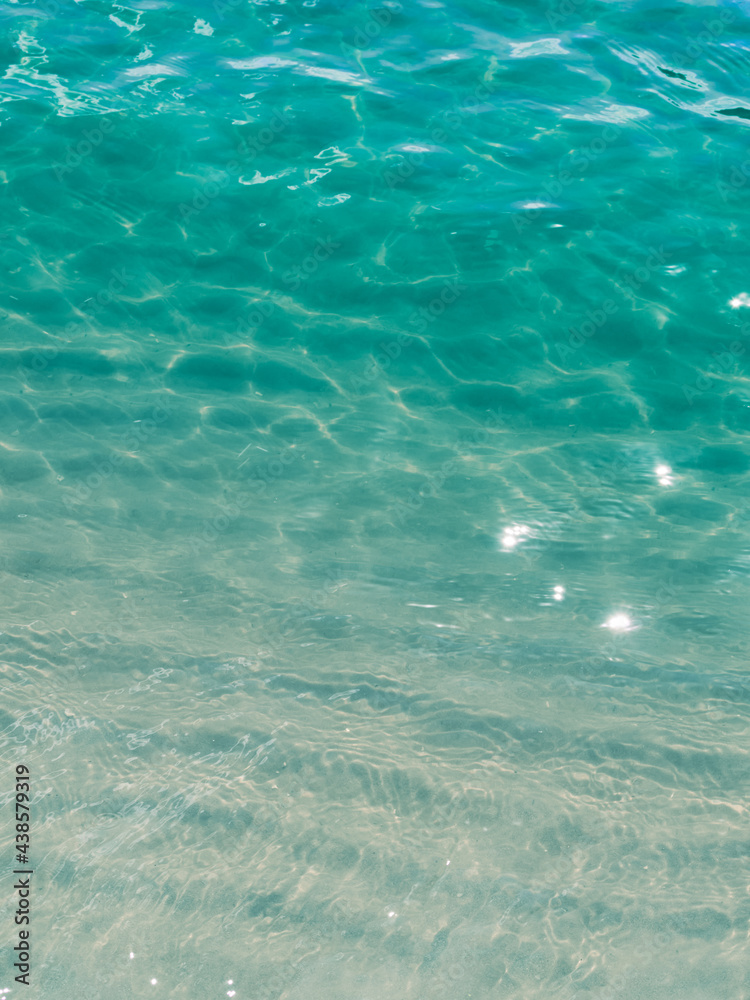 Surface transparent blue sea water.