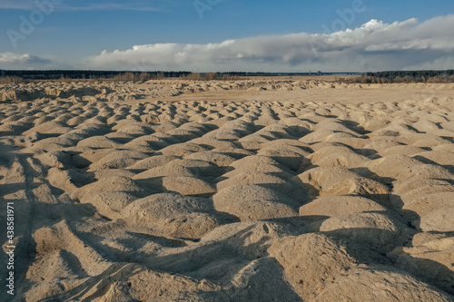 Aerial view of Sand Dunes and Stone Hills. Extraction of limestone for construction. Bornitsky quarry near an artificial lake. Dunes of the Cote d'Azur. photo