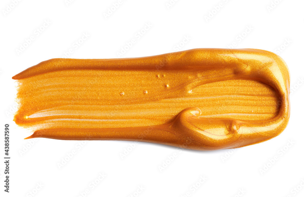 Golden paint smear isolated on white background