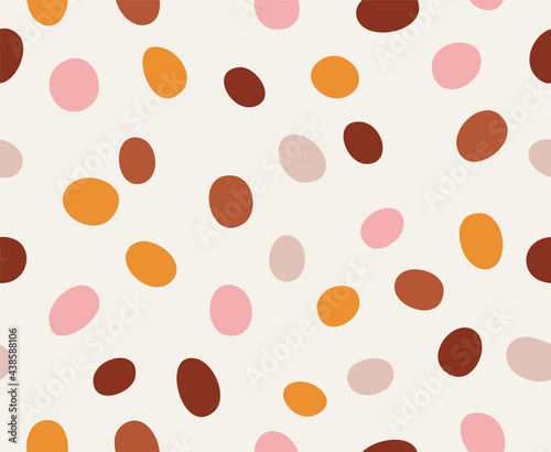 Seamless pattern of colored circles, isolated on beige background. A hand-drawn pattern of different shapes, in flat style. Suitable for web and print design.