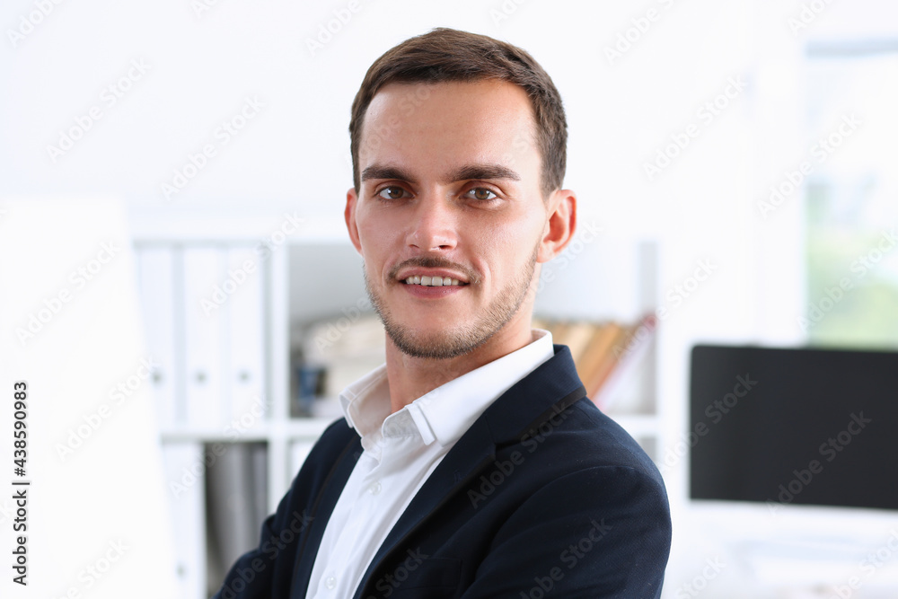 Fototapeta premium Handsome man in suit look in camera