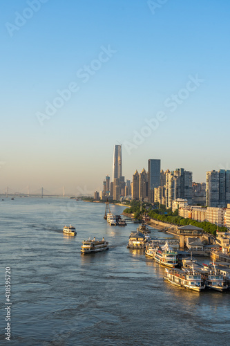 Wuhan skyline and Yangtze river with supertall skyscraper under construction in Wuhan Hubei China.
