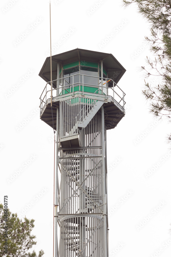 Fire watchtower with guard in the cabin