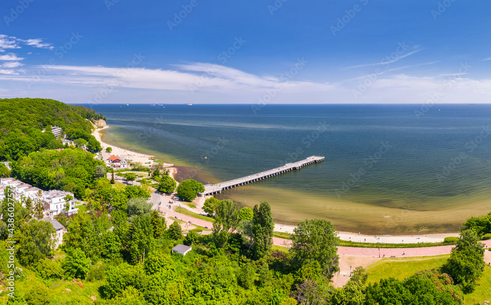 Aerial landscape of the beach and pier of the Baltic Sea in Gdynia Orłowo at summer, Poland.