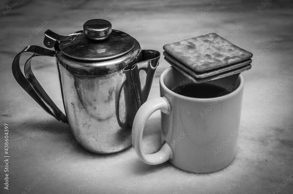 Cup of tea with dry biscuits on evening time during lockdown in Malaysia.