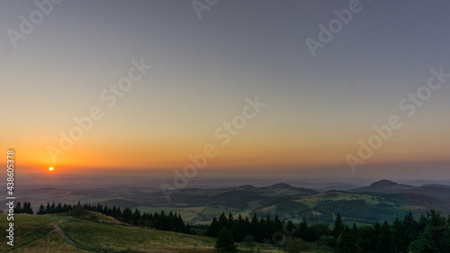 Sunset from Wasserkuppe  the highest point in Roehn Mountains under a clear sky  Germany