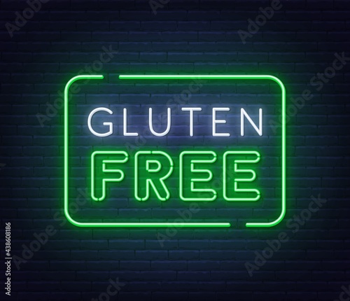 Gluten Free neon sign on brick wall background.