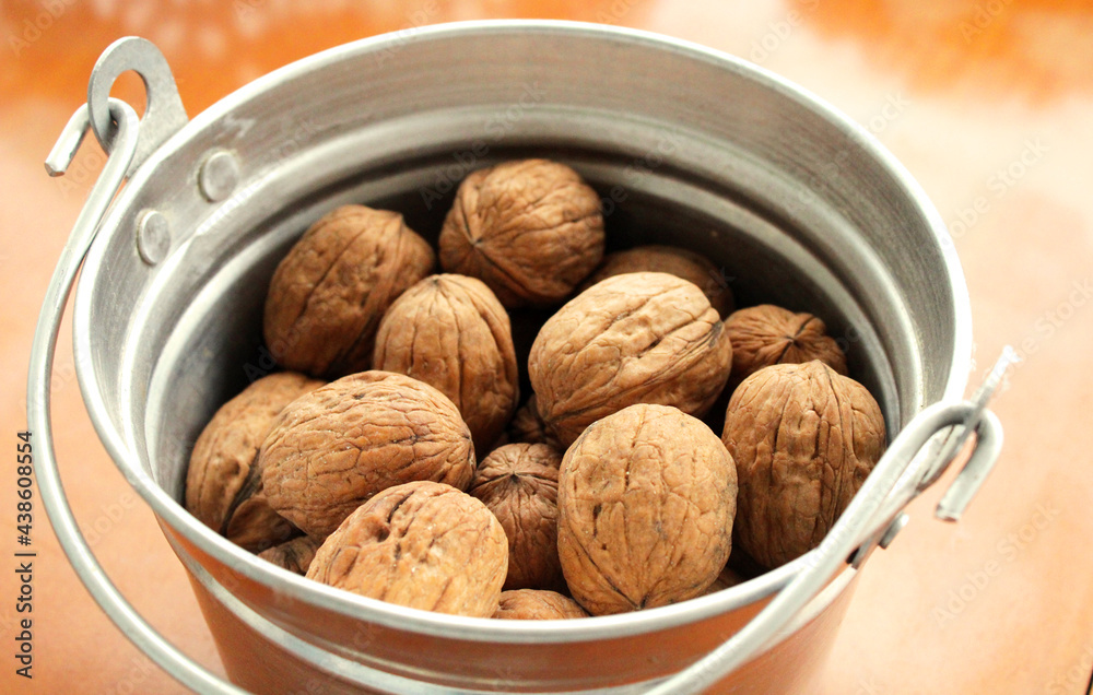 walnuts in the basket, dried fruits walnuts in the basket, dried fruits