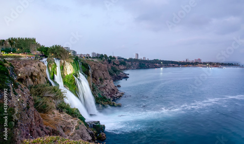 Lower D  den waterfall and rainbow formed over the sea. Photo from Antalya  Turkey