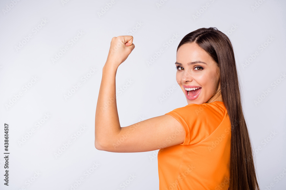 Closeup profile photo of bookmaker joyful lady supporting soccer team euro cup 2020 league raise fist wear national team football uniform orange t-shirt isolated white color background