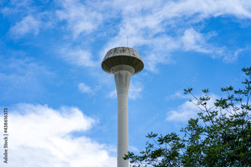 Water tower tank against blue sky. Water tower tank against blue sky.