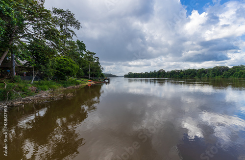Suriname River Surrounded By Forest Scenery In Brokopondo District