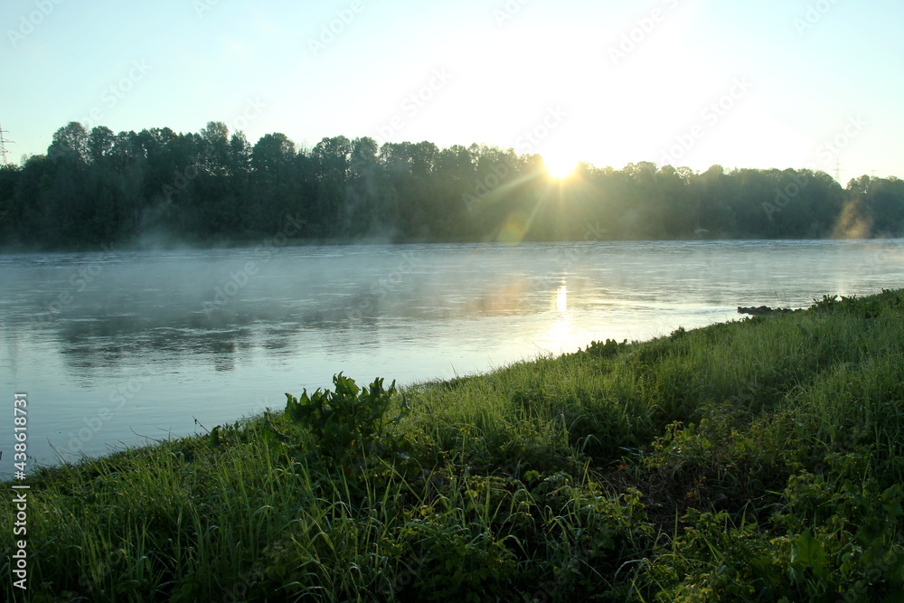 Fog on the river early in the morning during the summer Fog on the river early in the morning during the summer